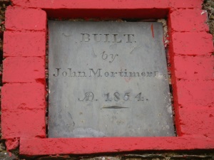 Plaque at Ty Mortimer holiday cottage, built by John Mortimer 1854